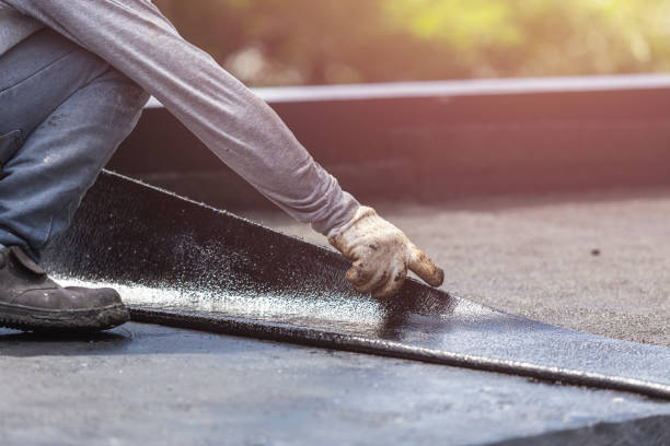 Professional Exterior Waterproofing technician working in Sterling, KS